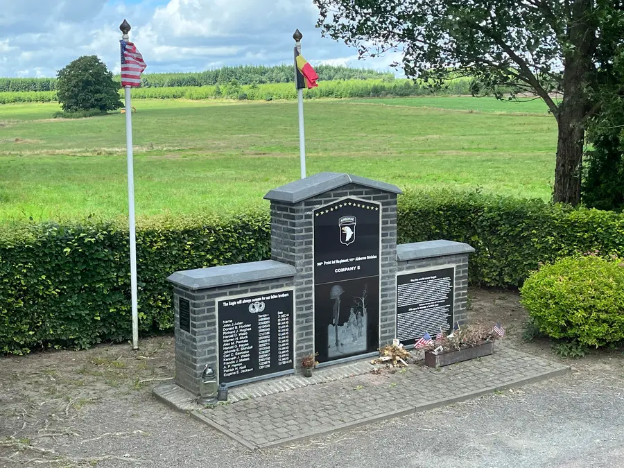The Winters monument from a distance, with open farmland stretching east toward the coast.
