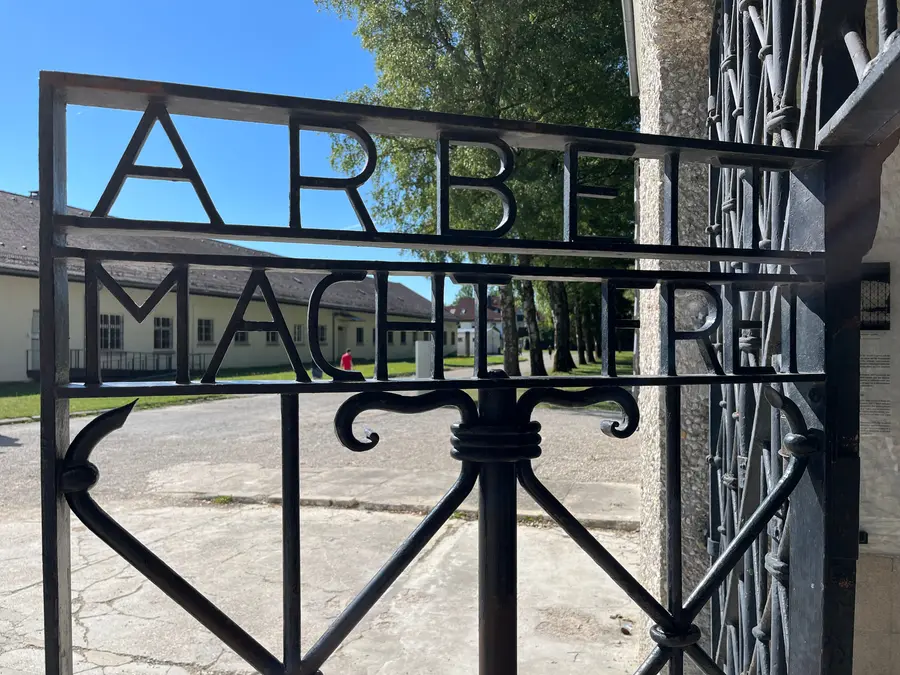 The wrought-iron gate bearing the words Arbeit macht frei.